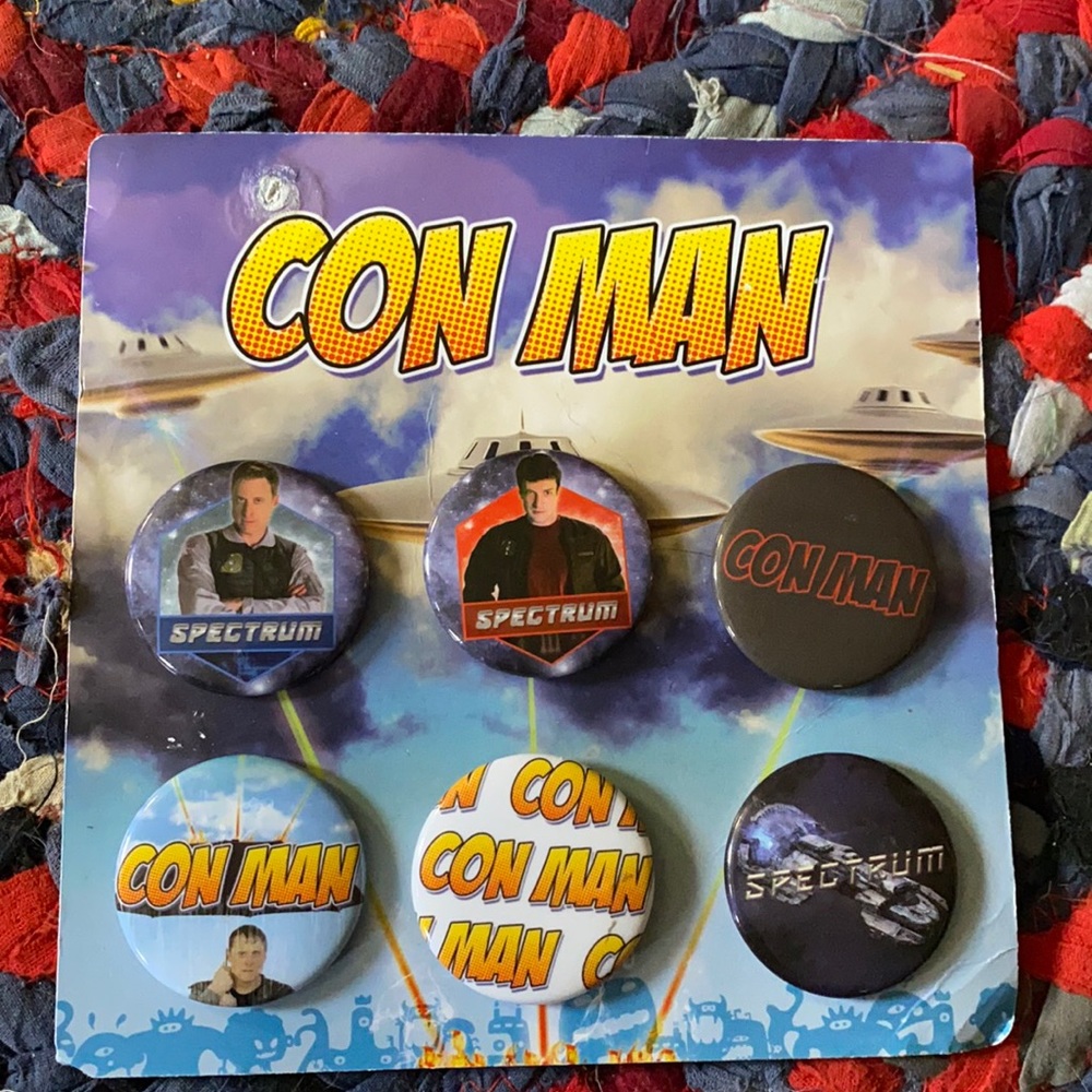 Con Man new in package pins never used